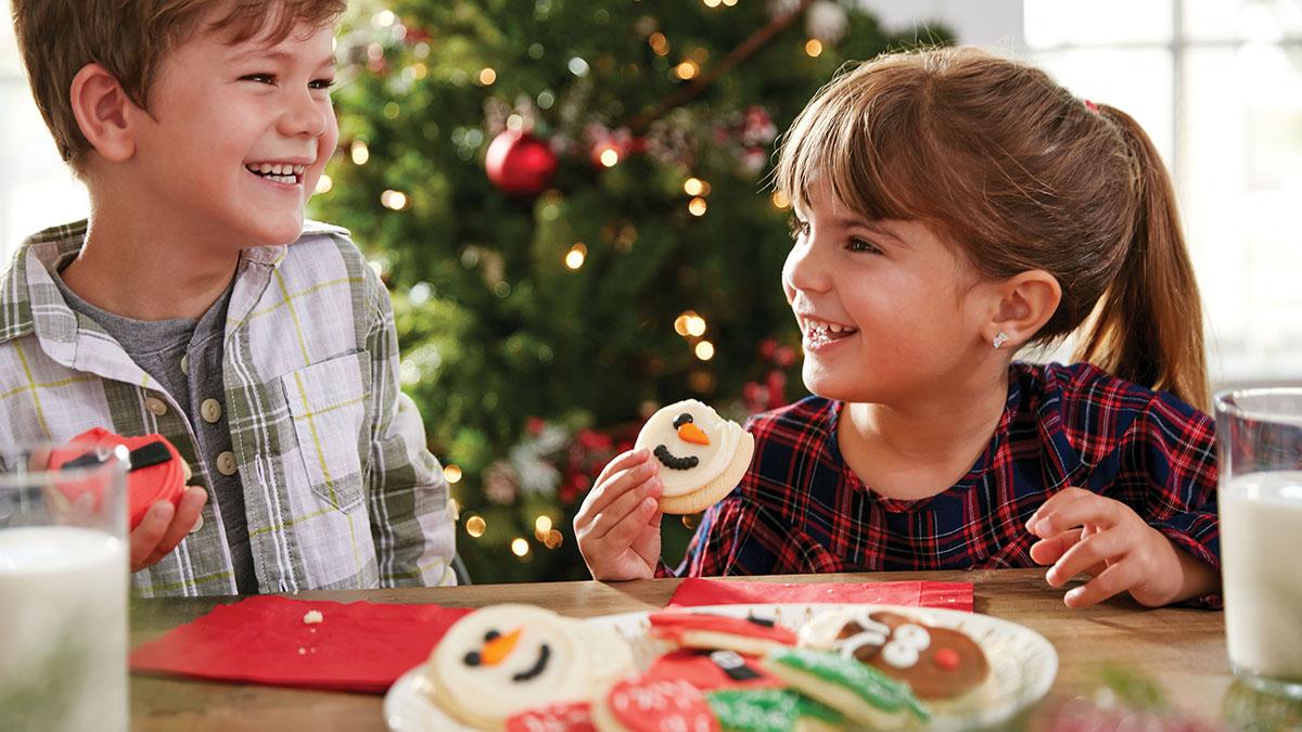 kids eating christmas cookies