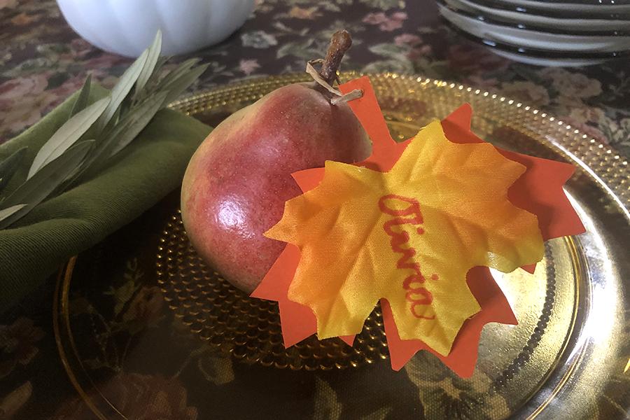 Photo of fabric autumn leaf with a pear