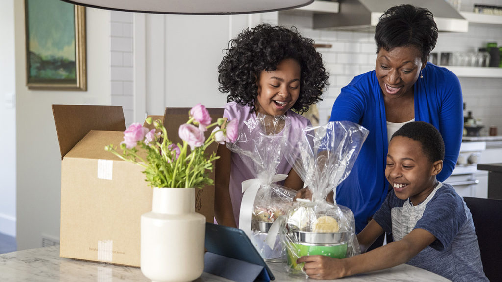 Photo of family receiving cookies