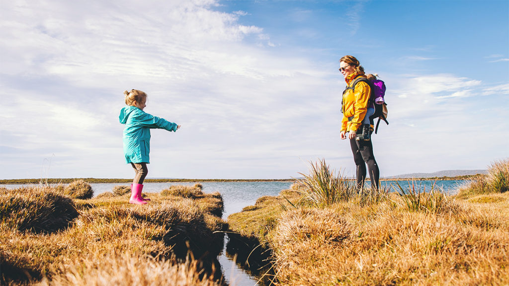 Summer bucket list item of a mother and daughter on a hike