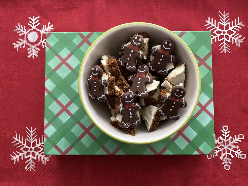 Photo of broken gingerbread cookies in a bowl