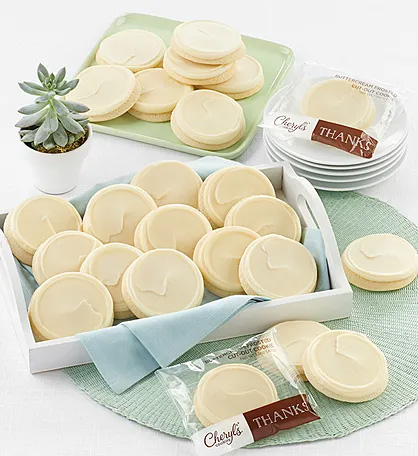 a photo of gift ideas for administrative professionals day buttercream frosted thank you cookies