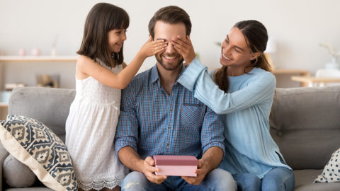 Father's Day messages with a dad getting a gift.