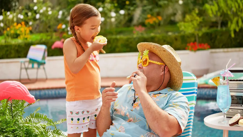 what kind of cookie is your dad dad in a lounge chair eating cookies with his daughter poolside.